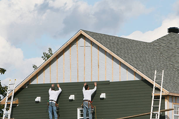 Professional Siding Contractor technician working in Grapeville, PA